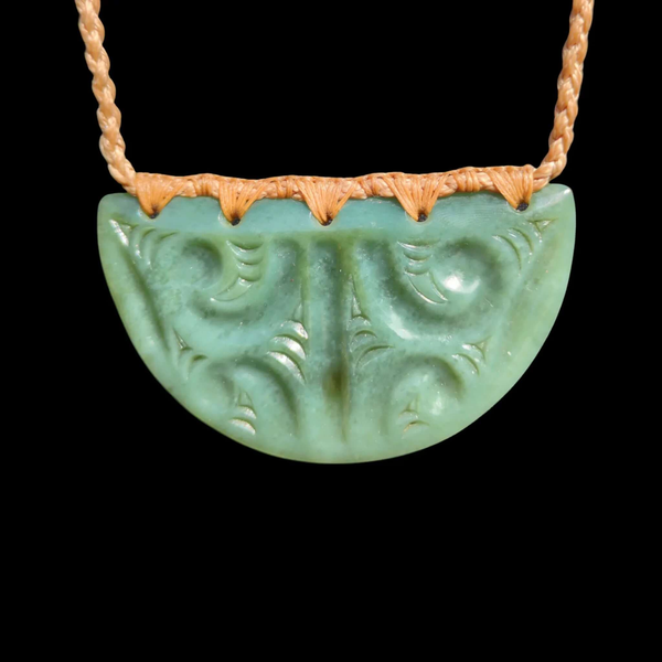 Kōuma Inanga Moko Kauae- Greenstone Breastplate Pendant - Sands Carving Studio