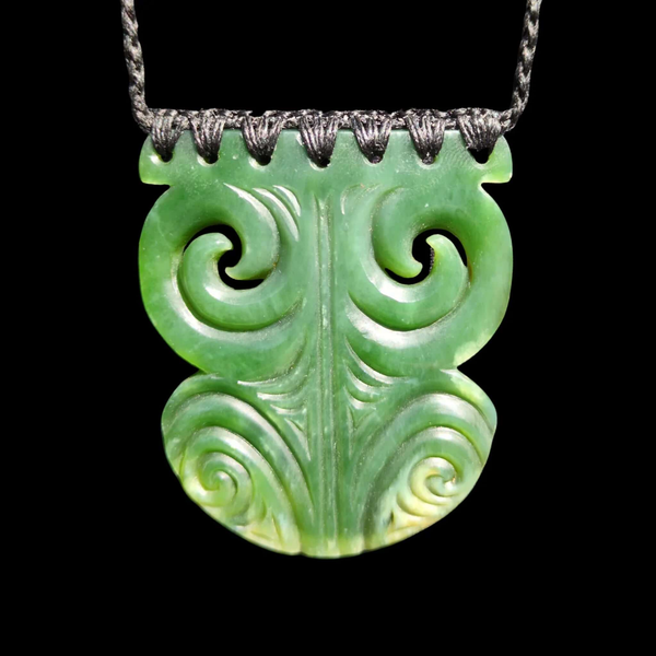 Kōuma Inanga Moko Kauae- Greenstone Breastplate Pendant - Sands Carving Studio