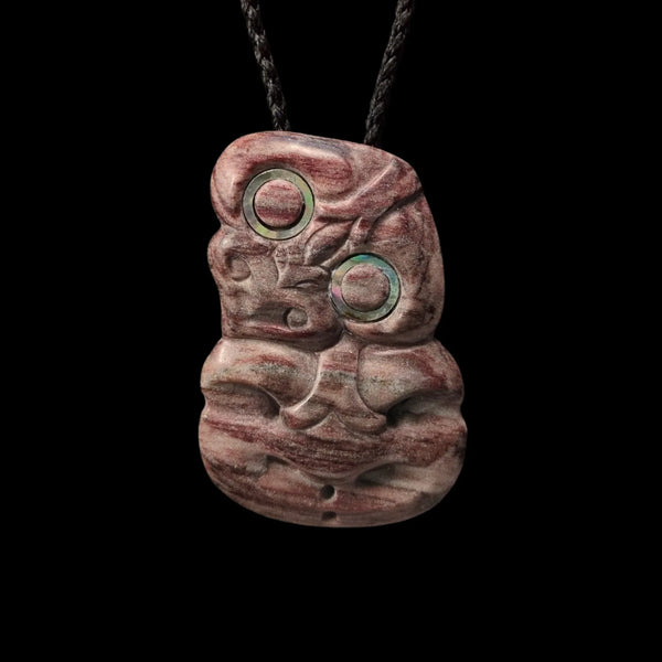 Hei Tiki Māwhero - Aroha Stone Tiki Pendant - Sands Carving Studio