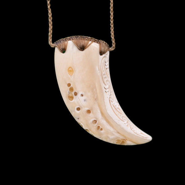 Rei Niho Parāoa - Carved Whale Tooth Pendant - Sands Carving Studio