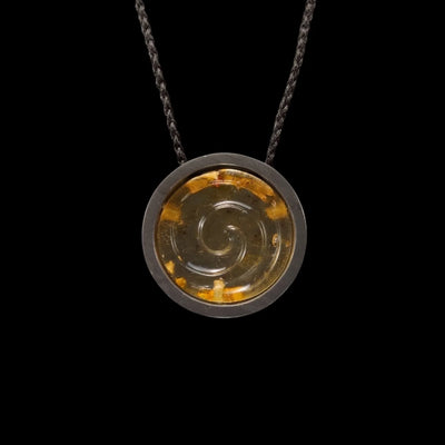 Koru Kāpia - Kauri Gum Spiral Pendant - Sands Carving Studio