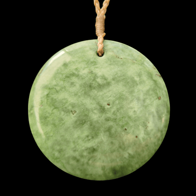 porohita inanga greenstone disc pendant by sands carving studio
