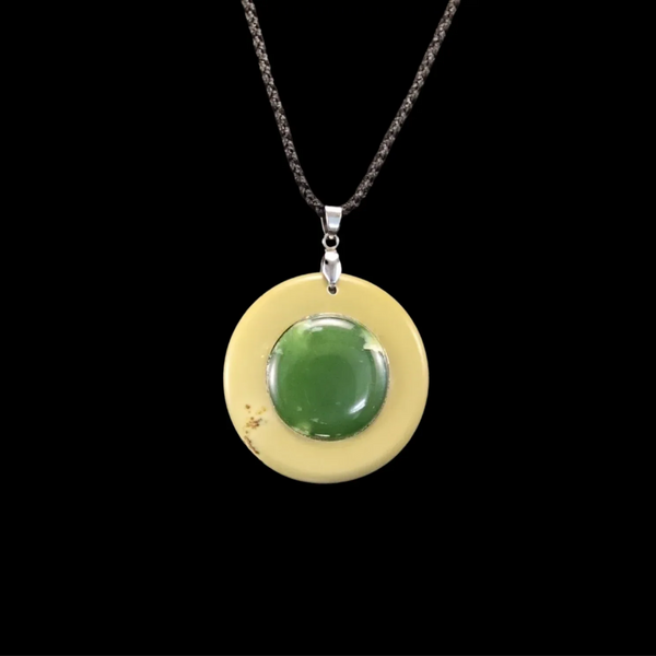 Kahurangi and Raukaraka Porohita - Greenstone Disc Pendant - Sands Carving Studio