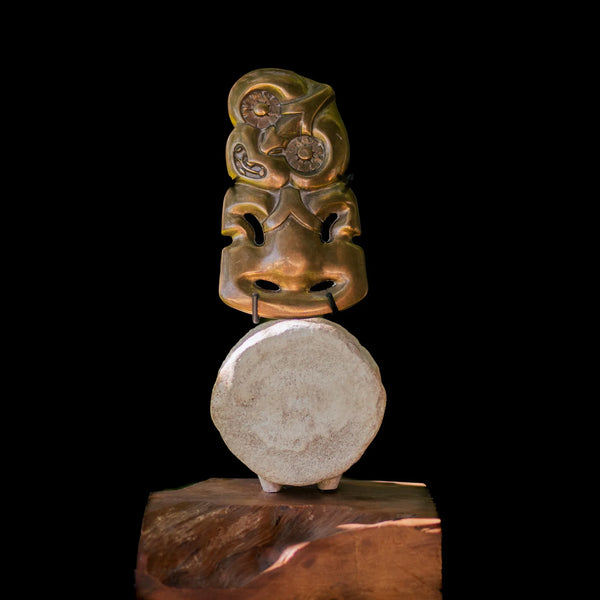 Limited Edition Bronze Hei Tiki Sculpture with a Whale Vertebrae and Kauri Base - Sands Signature - Sands Carving Studio